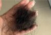 Mulher é espancada e tem parte do cabelo arrancado por dívida em compras de roupas