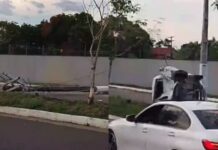 Carro é atingido por pickup, capota e fica preso entre destroços na Ponta Negra